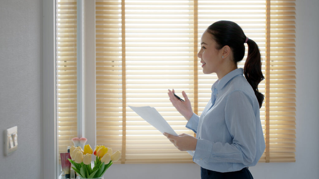 A sales rep practicing her sales pitch