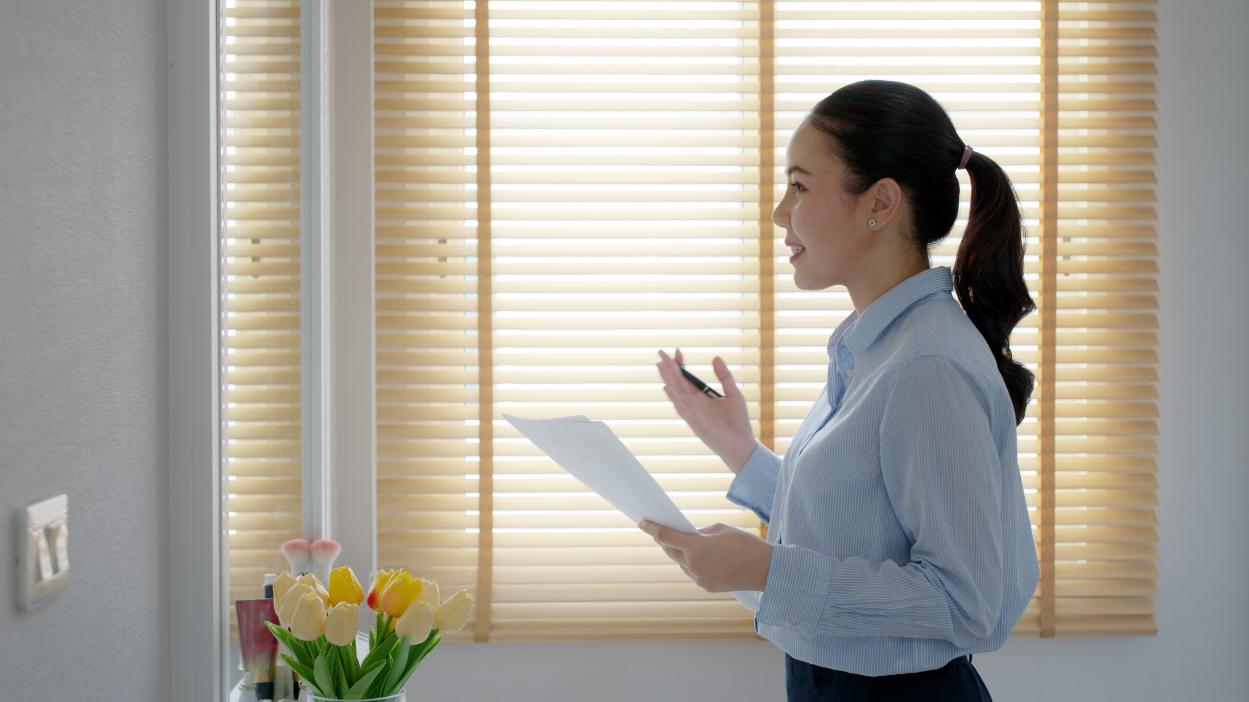 A sales rep practicing her sales pitch
