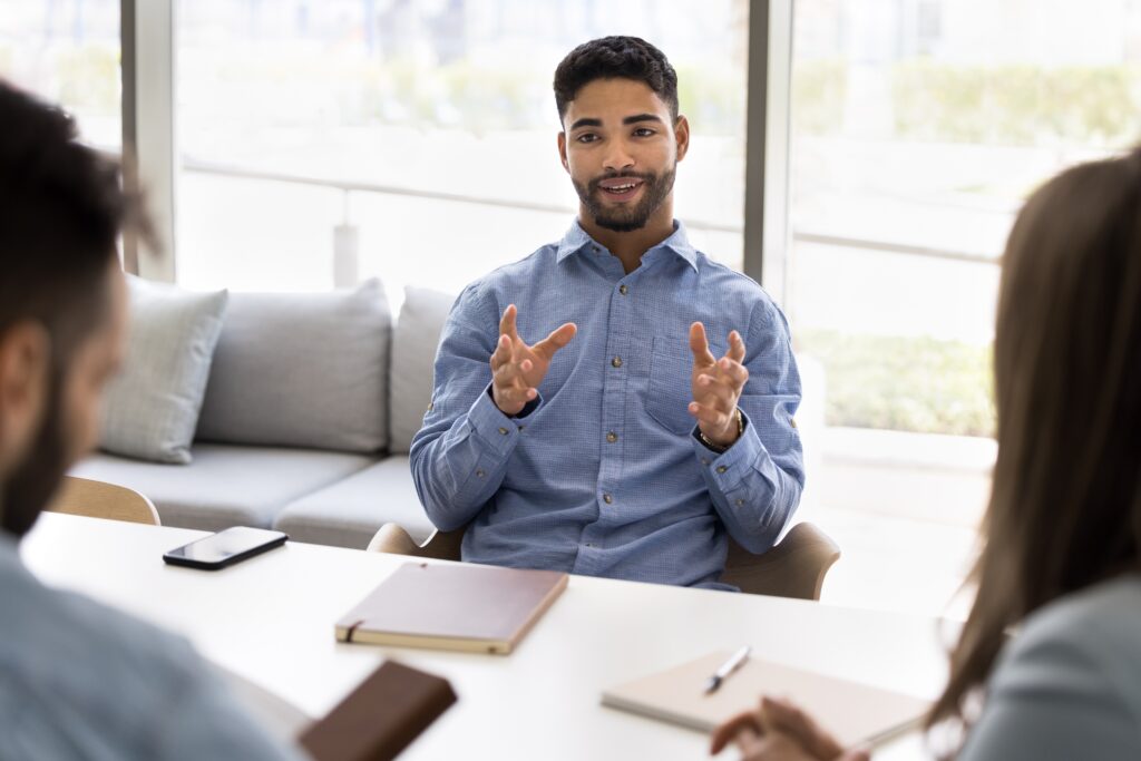 A representative using sales communication techniques with customers