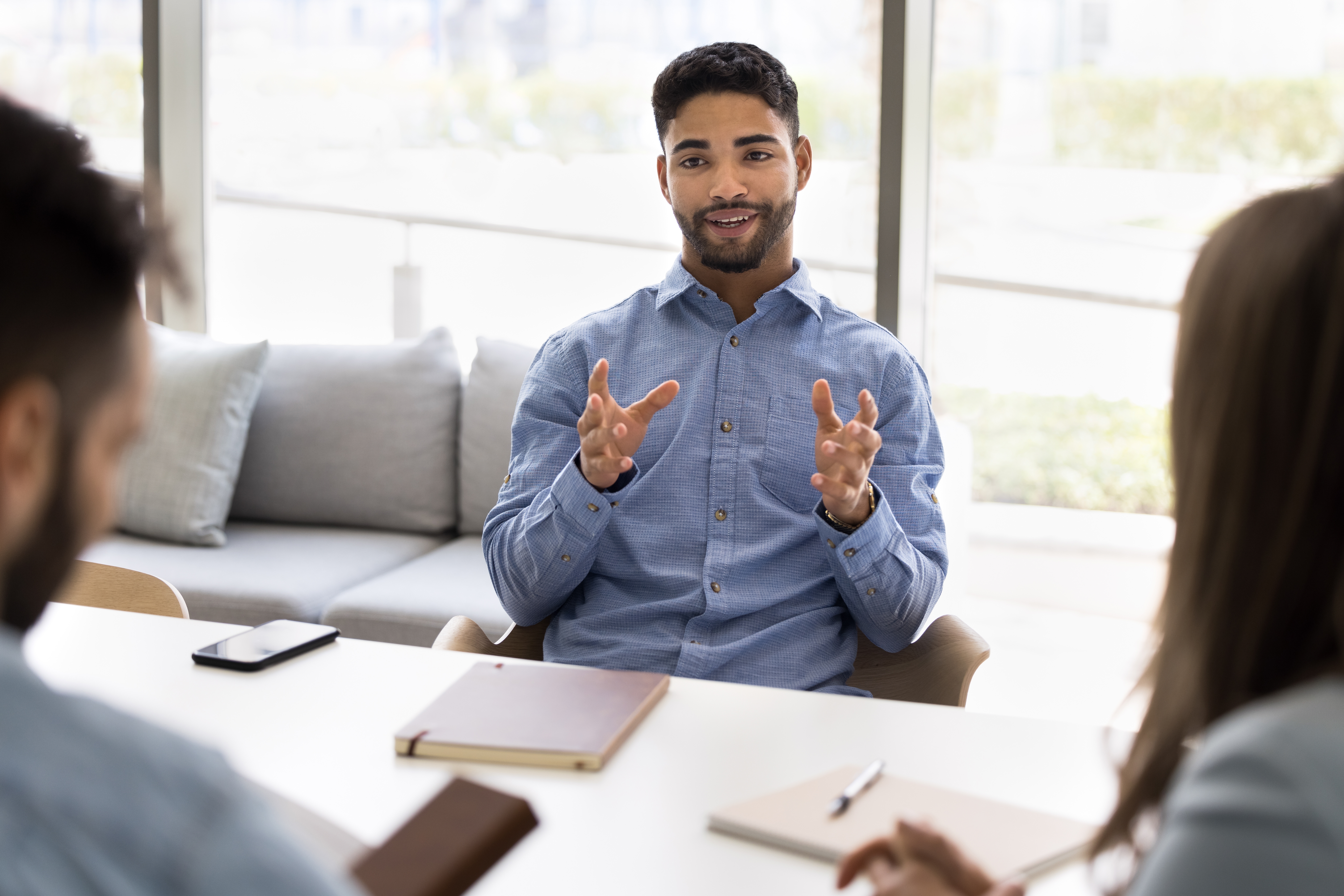 A representative using sales communication techniques with customers